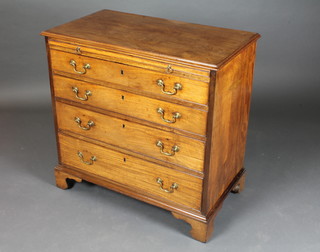 A handsome Georgian bleached mahogany chest of drawers with brushing slide and 4 long graduated drawers, raised on bracket  feet 33"w x 18 1/2"d x 32 1/2"h  ILLUSTRATED
