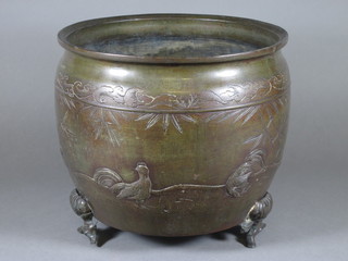 An Oriental circular bronze jardiniere decorated birds and raised  on panel supports 10 1/2"