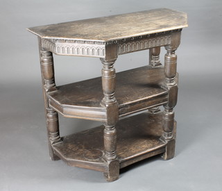 An oak 3 tier Credence buffet with arcaded decoration raised on turned and block supports 36"w x 18"d x 32"h