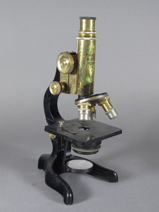 A gilt metal monocular microscope marked Hensoldt Wetzlar no.5886
