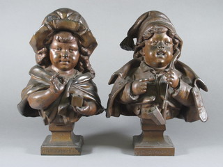A pair of Continental spelter match holders in the form of a boy  with pipe and girl ,f, the bases marked C'est Moi Grandpere and  Petit Grandmere 14"  ILLUSTRATED