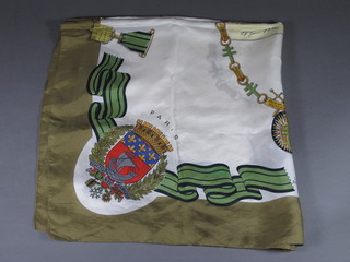A silk scarf decorated emblems of the French Resistance