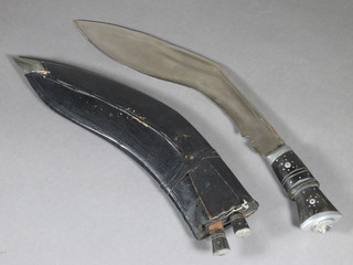 A Kukri with 11" blade, 2 skinning knives and complete with  scabbard