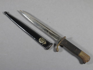 A paperknife in the form of a WWI German Mauser bayonet with  5" blade and scabbard