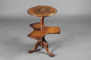 A Victorian circular mahogany sewing table raised on a pillar fitted a revolving tray 15" diameter x 27"h
