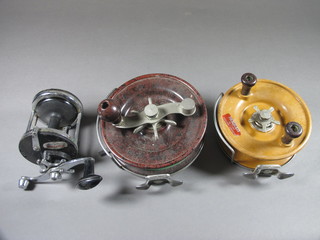 An Alvey chrome and Bakelite centre pin fishing reel 6", 1 other 5" together with an Intrepid Buccaneer fishing reel