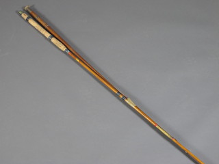 A mahogany 3 section fishing rod together with 1 other by John Bromley