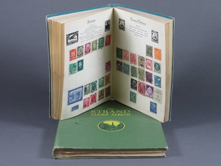 A green standard stamp album and a green Royal Mail stamp  album