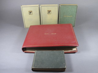 4 small photographs albums containing 1930's black and white photographs and 1 other photograph album