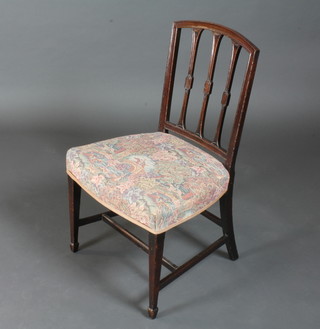 A Georgian mahogany stick and bar back dining chair with upholstered seat raised on square tapering supports