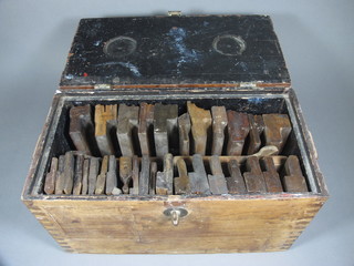 33 various 19th Century wooden moulding planes contained in an  oak box with hinged lid