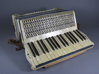 A Hohner Tango II accordion with 96 buttons