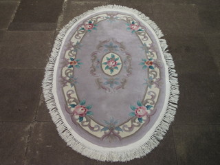 A grey ground and floral patterned Chinese rug 63" x 37"