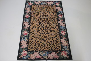 A floral patterned and black ground Aubusson style panel 60" x  34"