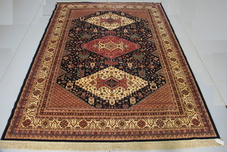 A Belgian cotton blue ground carpet with 3 diamonds to the  centre 106" x 78"