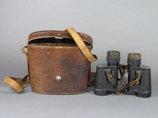 A pair of Deltrintem 8 x 30 field glasses with leather carrying  case