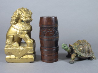 A gilt painted hardstone figure of a Dog of Fo 6", a resin figure  of a tortoise 4" and a turned Eastern wooden trinket box 5"