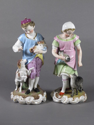 A pair of Continental porcelain figures of Girl with Cat and Boy with Dog, girl f, 8"