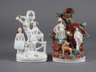 A Staffordshire flat back group of a lady and gentleman by  arbour 6" - f, and 1 other - f,