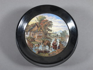 A 19th Century circular Prattware pot lid Fording The Stream contained in an ebonised socle frame 4"