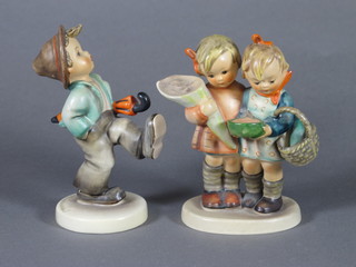 A Goebel figure of a whistling walking boy 4" and 1 other of 2 standing girls with basket - f and 4, 4"