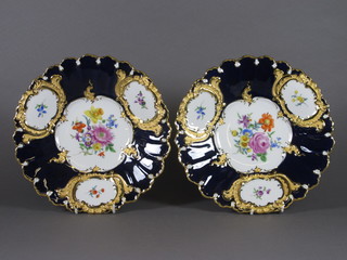 A pair of "Meissen" blue and gilt dishes with floral decoration,  the base incised 19a and with crossed swords mark   ILLUSTRATED