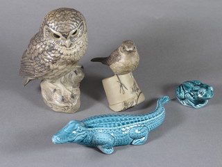 A Poole Pottery blue glazed figure of a crocodile 9", do. frog 2"  and a brown glazed Poole Pottery figure of a sparrow on flower  pot 4" and do. owl 6"
