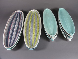 4 Poole Pottery leaf shaped dishes 16" - 1 with chip, and 9 13" ditto
