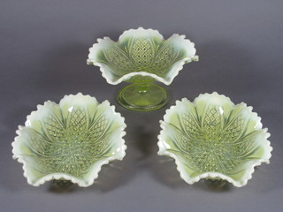 A Vaseline pressed glass pedestal bowl 7" and 2 boat shaped  dishes 8"