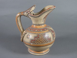 An Eastern terracotta jug the handle of the form of a serpent 7"
