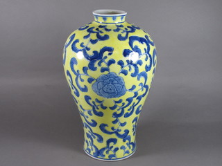 An Oriental yellow and blue glazed vase, base drilled, 15"