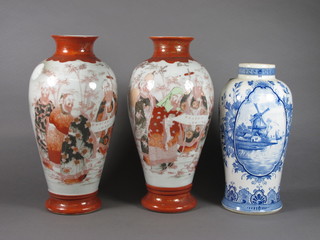 A pair of porcelain Oriental vases decorated courtly figures, together with a blue and white pottery vase with floral decoration  11"