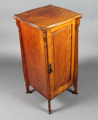 An Art Nouveau square mahogany pot cupboard enclosed by a  panelled door, raised on on panel supports 17"w x 17"h 36"