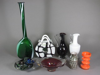 A green glass club shaped vase 20" and a collection of glass