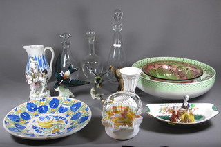 A faience plate decorated a bird 12", 2 Poole Pottery plates 10",  a Wedgwood plate decorated a classical scene, a Doulton wash  bowl, 4 decanters and other decorative ceramics