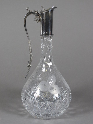 A modern etched and cut glass claret decanter with silver mount  11"  ILLUSTRATED