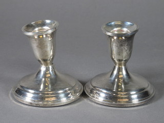 A pair of Sterling silver stub shaped candlesticks 3"