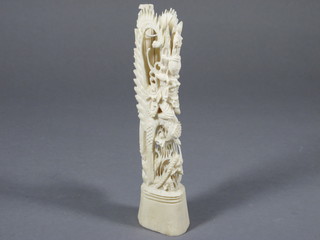 An Oriental pierced bone carving 7"