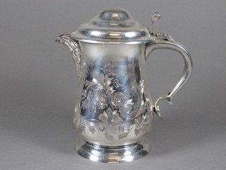 An engraved silver plated jug and cover of baluster form 8"