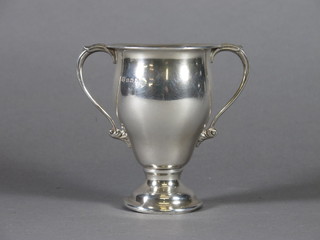 An engraved silver twin handled trophy cup Birmingham 1925, 3  ozs,