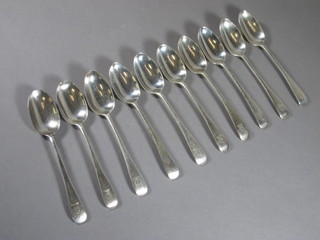A harlequin set of 10 silver Old English pattern teaspoons, London 1915, 1917 and 1936, with armorial decoration, 7ozs