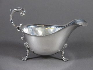 A Georgian style silver sauce boat with C scroll handle, Sheffield  1934, 5 1/2 ozs