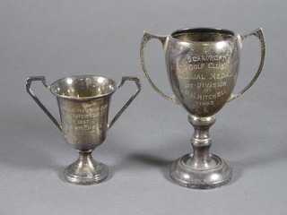 2 miniature silver twin handled trophy cups