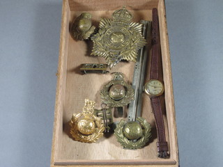 A George VI Royal Marines pith helmet badge, 2 Royal Marines cap badges and collar dogs and a lady's wristwatch