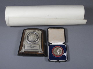 An enamelled medallion for the Jubilee of British Motor Industry 1946 and a metal trophy plaque - Oxted Vintage Car Rally 1953  and a 1948 Veteran Car Club of GB certificate