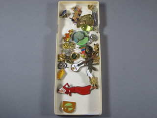 A collection of enamelled badges etc
