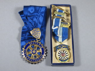 A silver gilt and enamel Rotary International Past President's  collar jewel - Oxted and Limpsfield, together with a gilt metal  Round Table Past Chairman's breast jewel