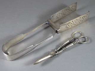 A pair of silver plated fiddle pattern asparagus servers together  with a pair of grape scissors