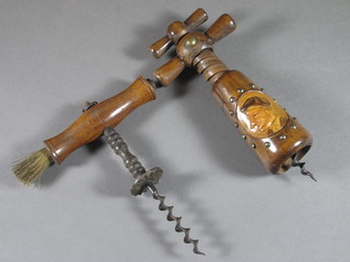 A 19th Century steel corkscrew with brush and 1 other
