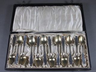 A set of 12 Art Deo WMF coffee spoons, cased